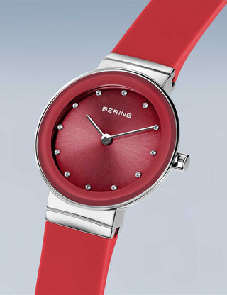 Angle shot of Bering 10129-503 Red Dial Silicone Womens Watch on white background