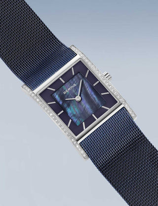 Angle shot of Bering 10426-397-S Blue Stainless Steel Womens Watch on white background