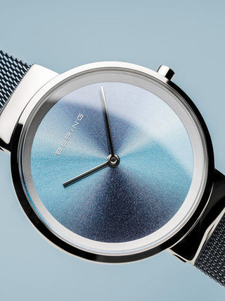 Angle shot of Bering 10X31-ANNIVERSARY2 Blue Stainless Steel Womens Watch on white background
