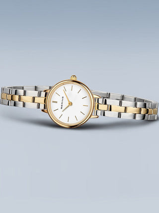 Angle shot of Bering 11022-714 White Dial Gold Stainless Steel Womens Watch on white background