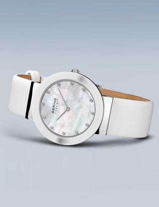 Angle shot of Bering 11435-604 Mother Of Pearl Dial White Leather Womens Watch on white background