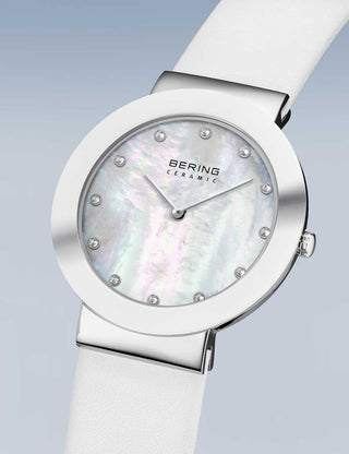 Angle shot of Bering 11435-604 Mother Of Pearl Dial White Leather Womens Watch on white background