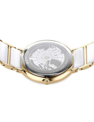 Angle shot of Bering 11435-758 White Dial Gold Stainless Steel Womens Watch on white background