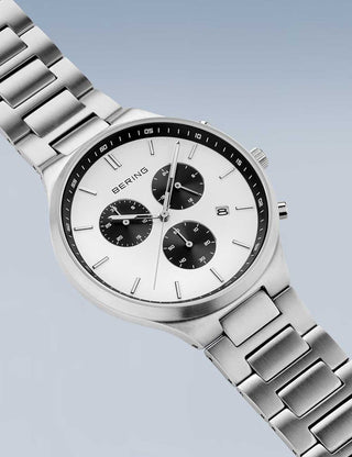 Angle shot of Bering Chronograph 11743-704 White Dial Silver Titanium Unisex Watch on white background