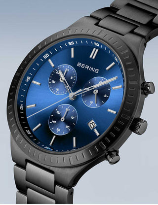 Angle shot of Bering Chronograph 11743-727 Blue Dial Black Titanium Unisex Watch on white background