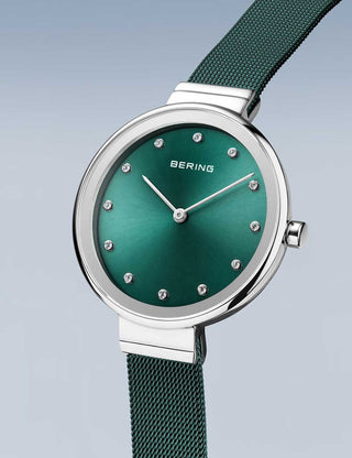 Angle shot of Bering 12034-808 Green Stainless Steel Womens Watch on white background