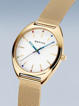 Angle shot of Bering 127220-36-334 White Dial Gold Stainless Steel Womens Watch on white background