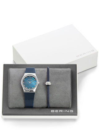 Angle shot of Bering 12927-307-GWP Blue Stainless Steel Womens Watch on white background