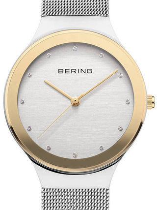 Front view of Bering 12934-010 Gold Dial Silver Stainless Steel Womens Watch on white background