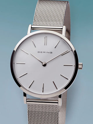 Angle shot of Bering 14134-004 White Dial Silver Stainless Steel Womens Watch on white background