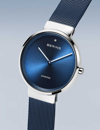 Angle shot of Bering 14531-309 Blue Dial Silver Stainless Steel Womens Watch on white background