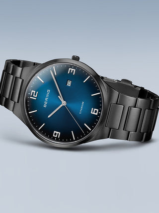 Angle shot of Bering 15240-727 Blue Dial Black Titanium Unisex Watch on white background