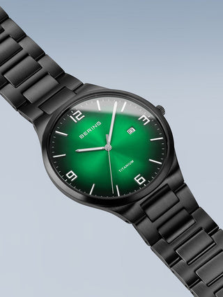 Angle shot of Bering 15240-728 Green Dial Black Titanium Unisex Watch on white background