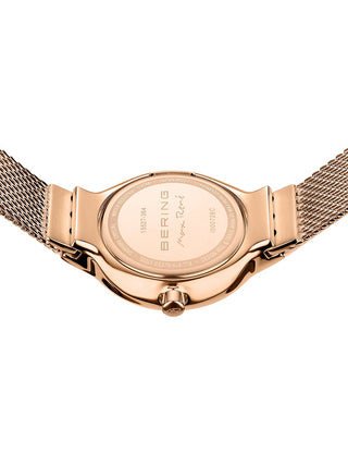 Angle shot of Bering 15527-364 Mother Of Pearl Dial Rose Gold Stainless Steel Womens Watch on white background