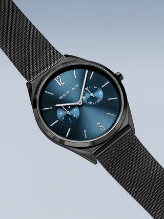 Angle shot of Bering 17140-227 Blue Dial Black Stainless Steel Unisex Watch on white background