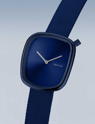 Angle shot of Bering 18034-397 Blue Textile Womens Watch on white background