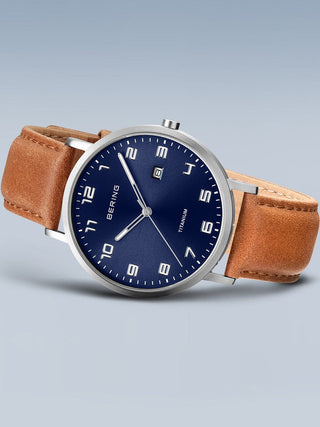 Angle shot of Bering 18640-567 Blue Dial Brown Leather Unisex Watch on white background