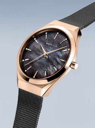 Angle shot of Bering 18729-166 Mother Of Pearl Dial Black Stainless Steel Womens Watch on white background