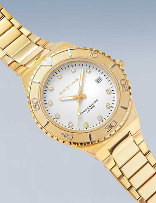 Angle shot of Bering 18936-734 White Dial Gold Stainless Steel Womens Watch on white background