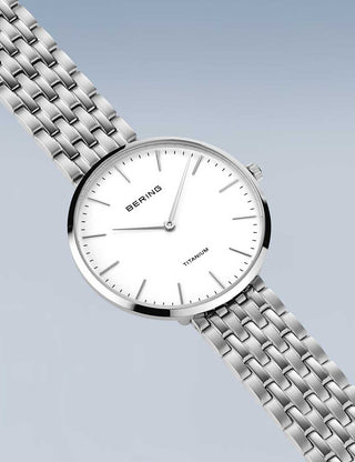 Angle shot of Bering 19334-004 White Dial Silver Titanium Womens Watch on white background