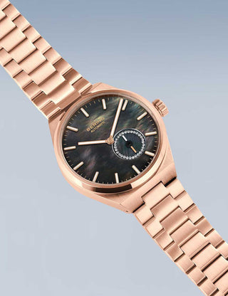 Angle shot of Bering 19435-762 Mother Of Pearl Dial Rose Gold Stainless Steel Womens Watch on white background