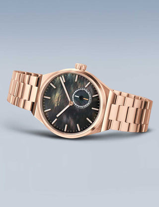 Angle shot of Bering 19435-762 Mother Of Pearl Dial Rose Gold Stainless Steel Womens Watch on white background