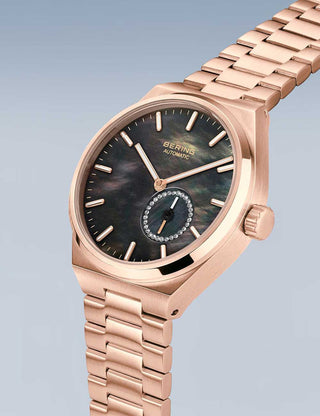 Angle shot of Bering 19435-762 Mother Of Pearl Dial Rose Gold Stainless Steel Womens Watch on white background