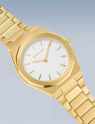 Angle shot of Bering 19632-730 White Dial Gold Stainless Steel Womens Watch on white background