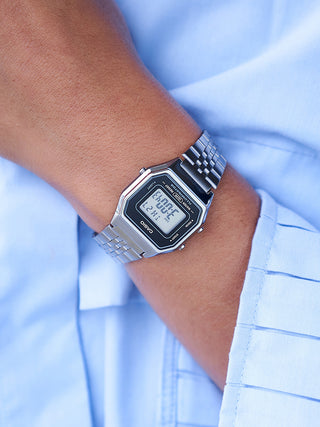 Angle shot of Casio LA680WEA-1EF Black Dial Silver Stainless Steel Unisex Watch on white background