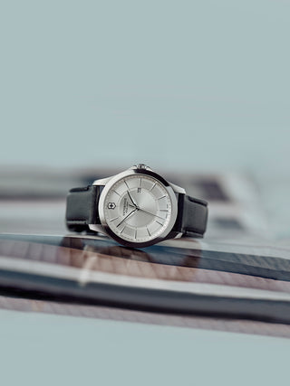 Angle shot of Victorinox 241905 Silver Dial Black Leather Unisex Watch on white background