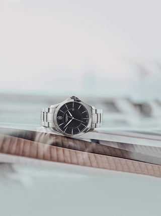 Angle shot of Victorinox 241909 Black Dial Silver Stainless Steel Unisex Watch on white background
