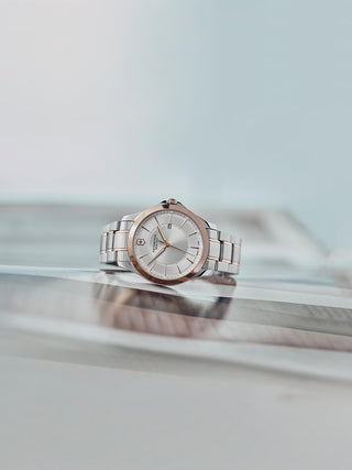 Angle shot of Victorinox 241912 Silver Dial Rose Gold Stainless Steel Unisex Watch on white background