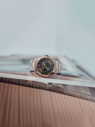 Angle shot of Victorinox 241913 Black Dial Rose Gold Stainless Steel Unisex Watch on white background