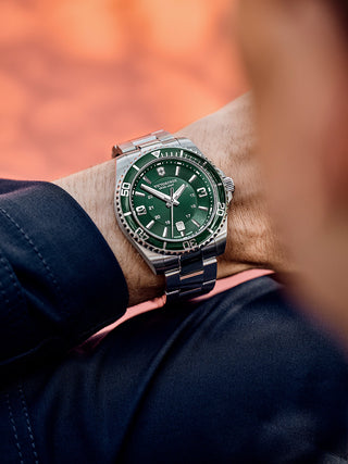 Angle shot of Victorinox 241934 Green Dial Silver Stainless Steel Unisex Watch on white background