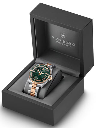 Angle shot of Victorinox 242008 Green Dial Rose Gold Stainless Steel Unisex Watch on white background