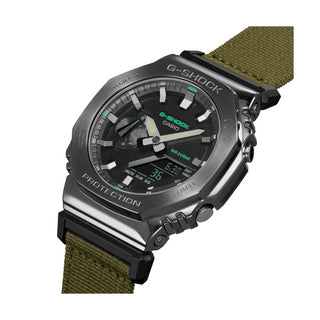 Angle shot of Casio G-Shock GM-2100CB-3AER Black Dial Green Fabric Mens Watch on white background