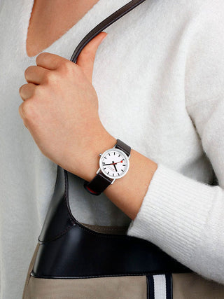 Angle shot of Mondaine A658.30323.11SBBV White Dial Black Leather Womens Watch on white background