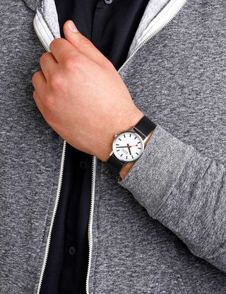 Angle shot of Mondaine A660.30314.16SBBV White Dial Black Leather Unisex Watch on white background