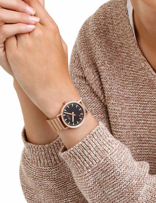 Angle shot of Mondaine A660.30314.16SBR Black Dial Rose Gold Stainless Steel Unisex Watch on white background