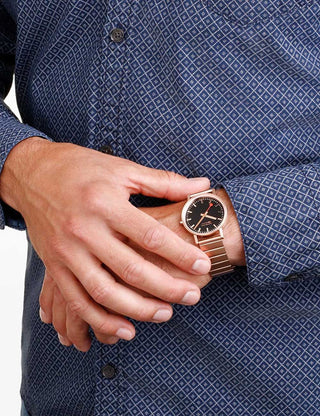 Angle shot of Mondaine A660.30314.16SBR Black Dial Rose Gold Stainless Steel Unisex Watch on white background