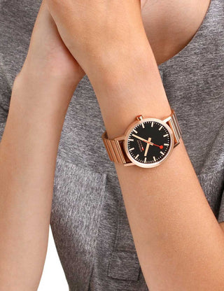 Angle shot of Mondaine A660.30360.16SBR Black Dial Rose Gold Stainless Steel Unisex Watch on white background