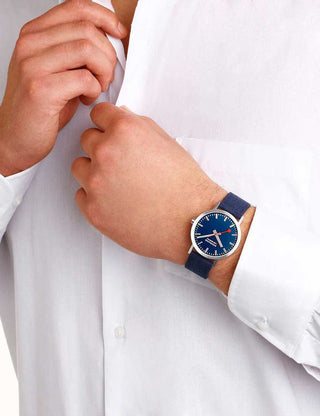 Angle shot of Mondaine A660.30360.40SBD Blue Textile Unisex Watch on white background