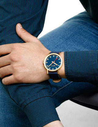 Angle shot of Mondaine A660.30360.40SBQ Blue Textile Unisex Watch on white background