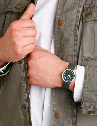 Angle shot of Mondaine A660.30360.60SBF Green Textile Unisex Watch on white background