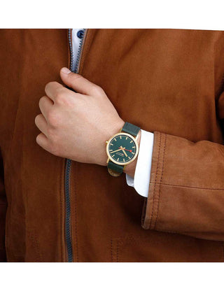 Angle shot of Mondaine A660.30360.60SBS Green Textile Unisex Watch on white background