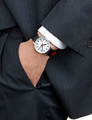 Angle shot of Mondaine A667.30314.11SBBV White Dial Black Leather Unisex Watch on white background