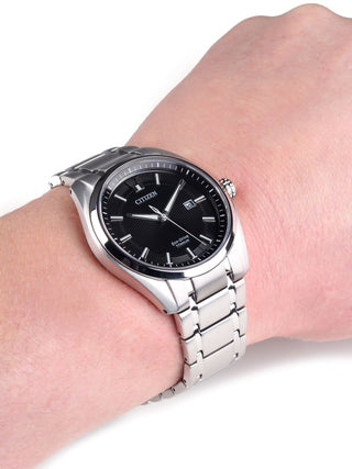 Angle shot of Citizen AW1240-57E Black Dial Silver Titanium Unisex Watch on white background
