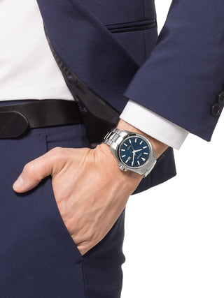 Angle shot of Citizen BM7470-84L Blue Dial Silver Titanium Unisex Watch on white background