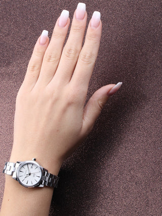 Angle shot of Citizen Basic EU6070-51D Mother Of Pearl Dial Grey Stainless Steel Womens Watch on white background