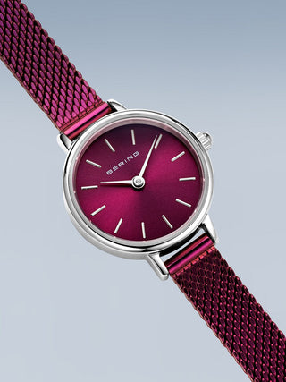 Angle shot of Bering 11022-909 Purple Stainless Steel Womens Watch on white background